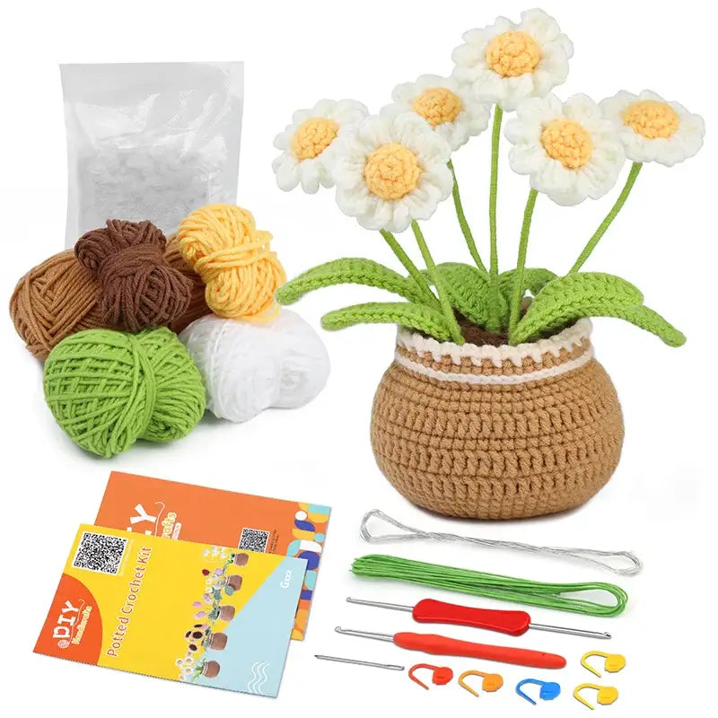 Kit peluche crochet pot de fleur avec pot marron et fleurs blanches jaunes accompagné de pelotes et outils de crochet