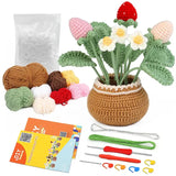 Peluche crochet pot de fleur marron avec bordure blanche tenant une plante en crochet fraises fleurs vert rose blanc