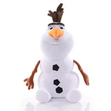 Peluche disney olaf blanche avec cheveux brun en forme de bois de cerf nez carotte orange boutons hexagonaux noirs capture lesprit joyeux et magie hivernale