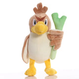 Peluche doudou mignonne canarticho tan avec ventre blanc et bec jaune tenant une carotte verte