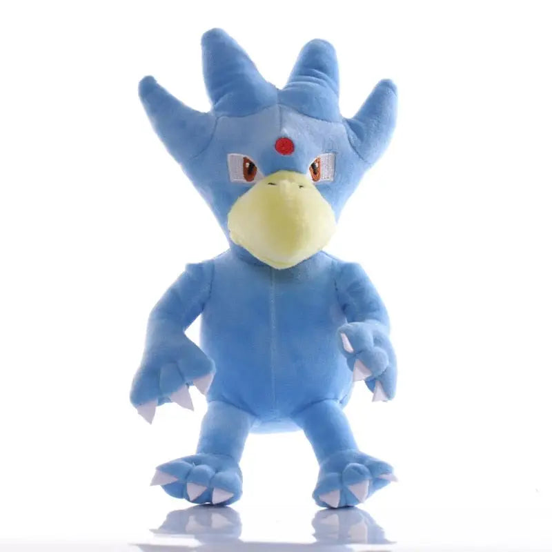 Peluche doudou pokemon golduck bleu avec bec jaune, taches rouges, touffes pointues et griffes blanches