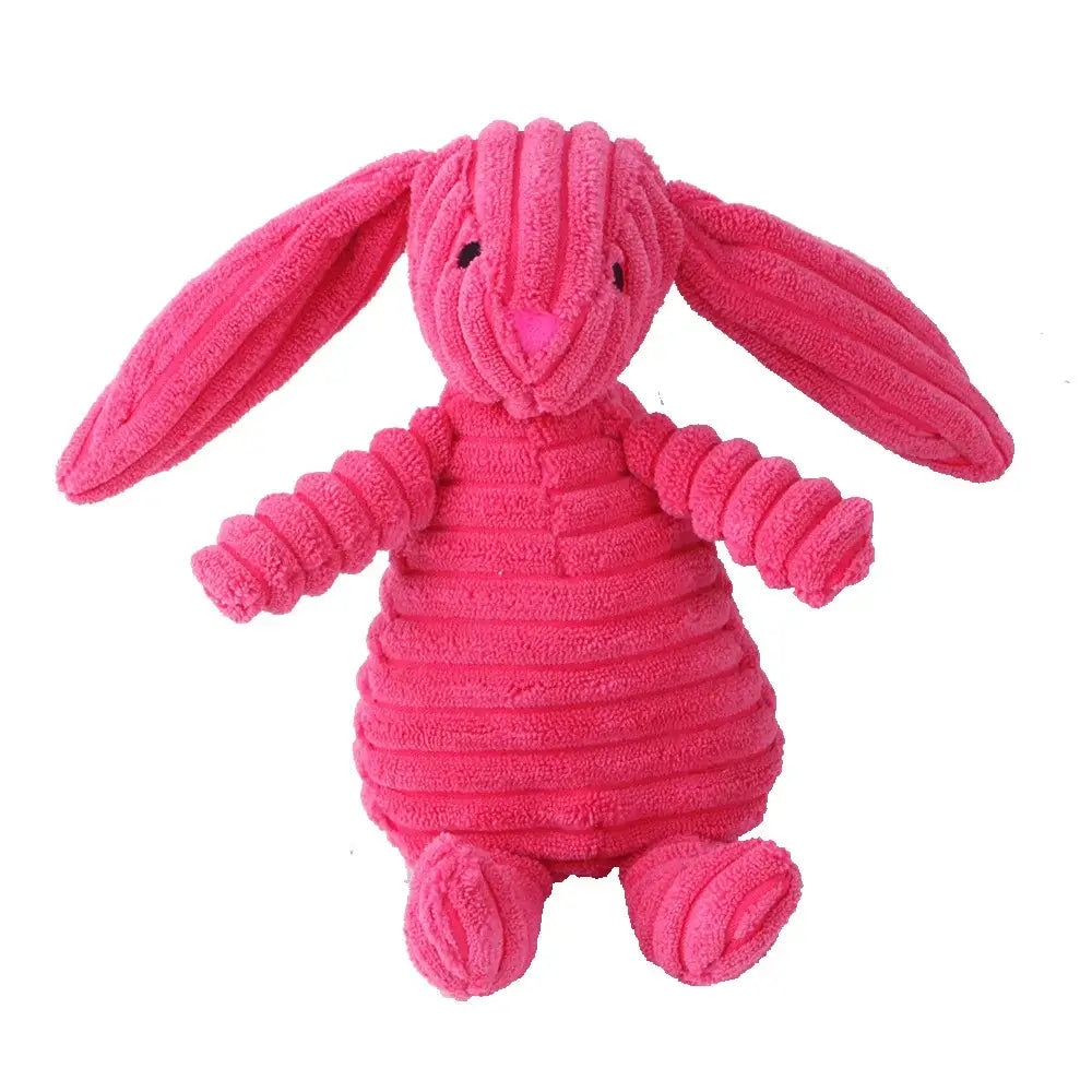 Peluche animale en velours côtelé rose avec sifflet intégré et design résistant aux morsures pour chiens