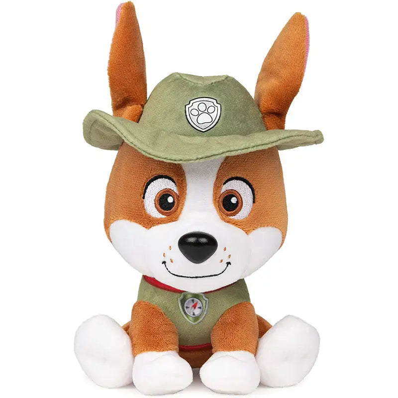Peluche la patpatrouille paw patrol d’un chiot marron et blanc avec chapeau vert et gilet à motif boussole