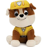 Peluche la patpatrouille paw patrol de chiot marron et blanc avec casque et gilet jaune dans lunivers palpitant