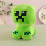Peluche minecraft creeper 25 cm verte avec visage pixelisé noir et motifs à carreaux sur les pieds en peluche douce