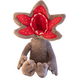 Peluche stranger things personnage gris avec bouche rouge et coutures blanches, idéale pour déguisement carnaval