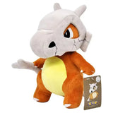 Ravissante peluche pokémon cubone osselait douce avec tête en forme de crâne grise et corps orange jaune