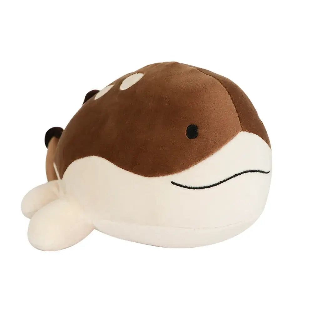 Peluche Pokémon Terraiste Clodsire avec une peluche de baleine brun et blanc