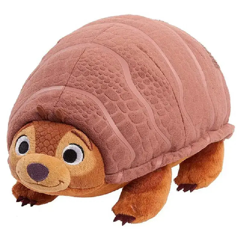 Peluche sisu tuk-tuk raya et le dernier dragon avec shell brun texturé et corps beige en peluche raya disney