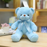 Peluche teddy bear couleur bleu clair en peluche douce avec ruban en satin et yeux en boutons noirs