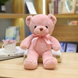 Peluche teddy bear couleur rose doux en peluche avec ruban satin assorti noué au cou