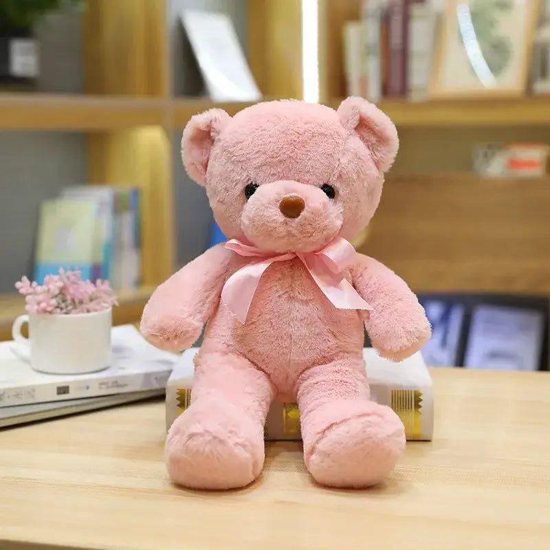 Peluche teddy bear couleur rose doux en peluche avec ruban satin assorti noué au cou