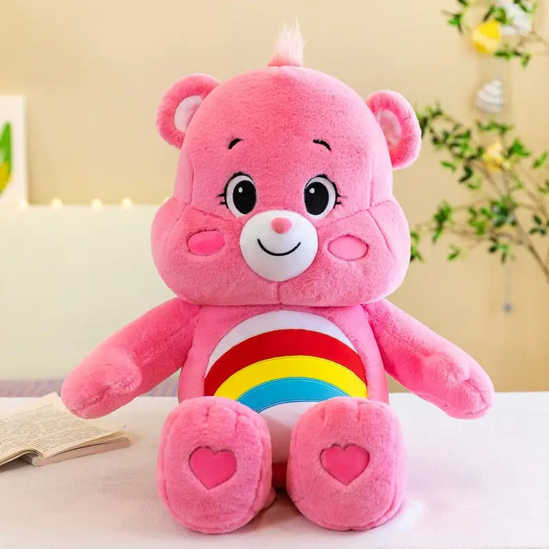 Peluches bisounours care ours en peluche rose avec emblème arc-en-ciel et pieds en forme de cœur en peau couture serrée