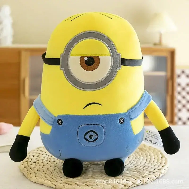 Peluches minions personnages 30cm peluche jaune avec un œil gris entouré et salopette bleue découvrez l’univers ludique