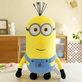 Peluche minion jaune en salopette bleue avec gants noirs dans peluches minions personnages anime 30cm découvrez l’univers ludique