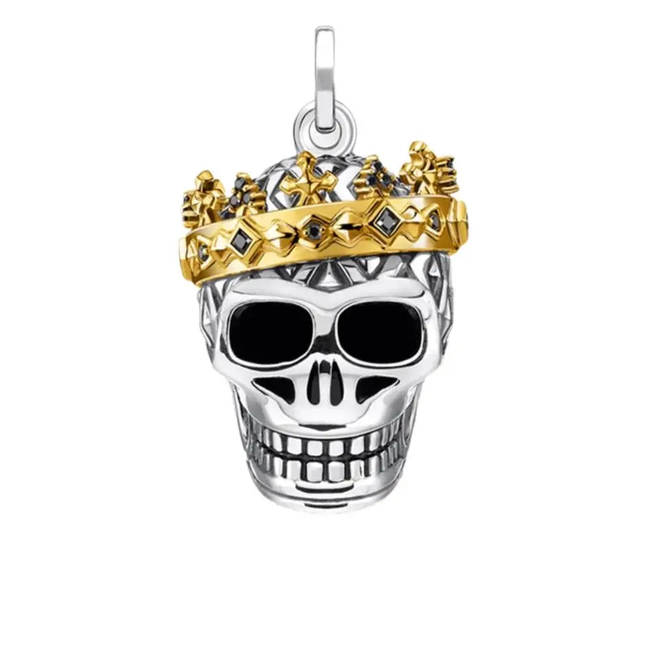 Pendentif tête de mort couronnée en argent avec couronne en or sertie de diamants noirs finition soignée
