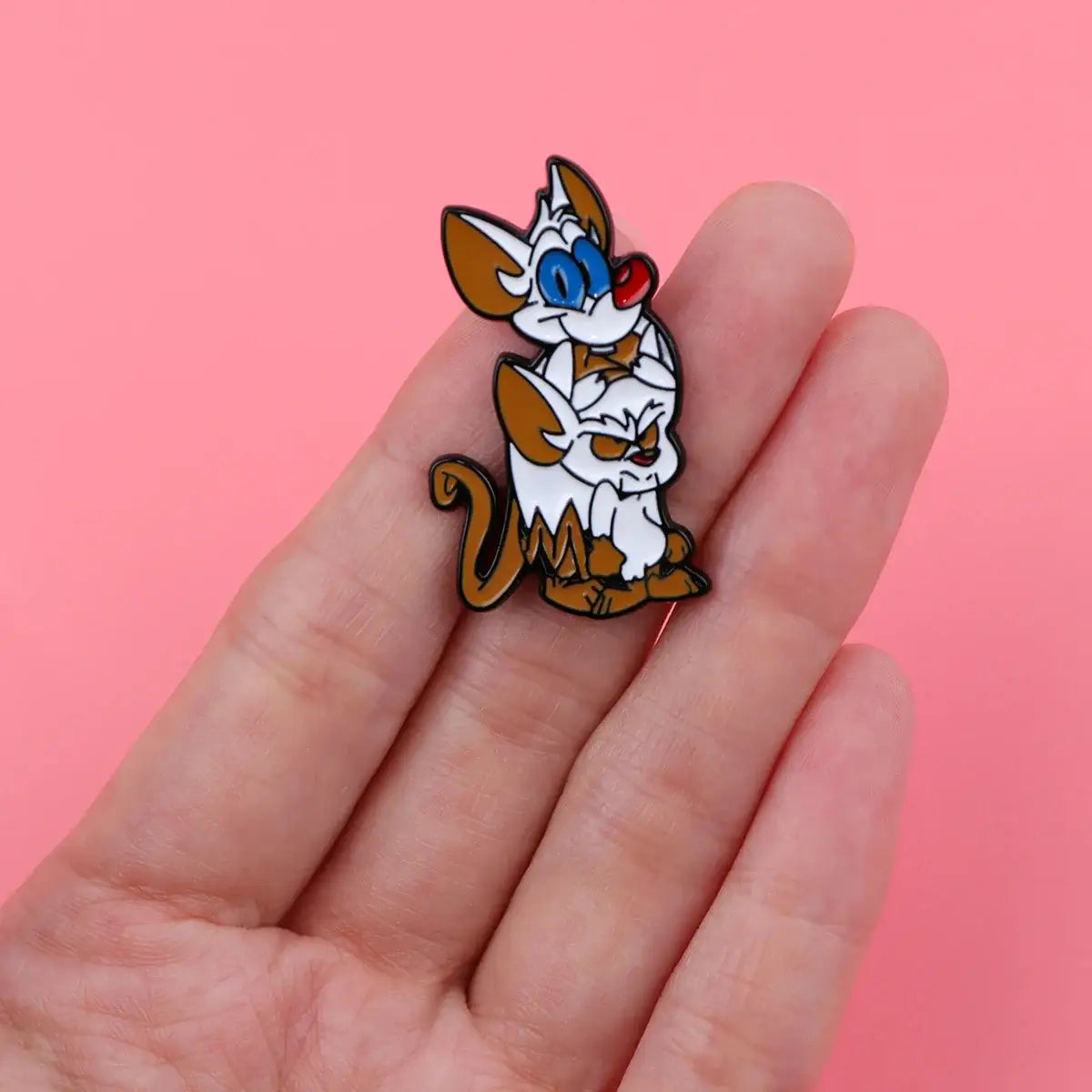 Minus and Cortex Cartoon Pin