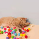 Plush ball launcher for cats