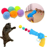 Pistolet lanceur bleu et jaune en plastique avec boules en peluche colorées jouet interactif pour chat