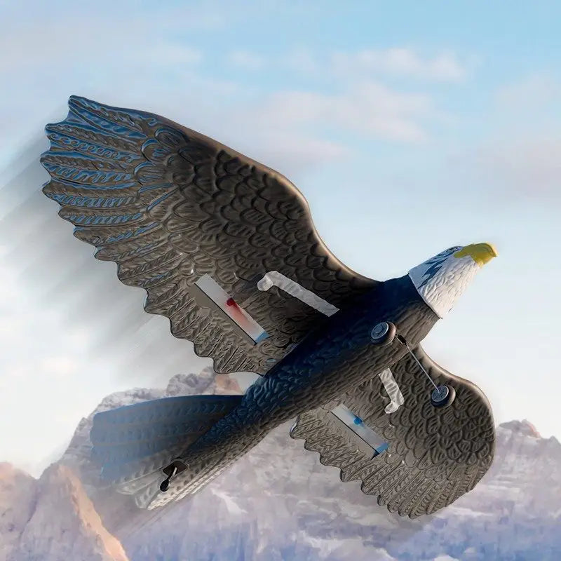 Planeur télécommandé oiseau aigle facile à piloter en plastique gris foncé avec tête blanche et bec jaune détaillé