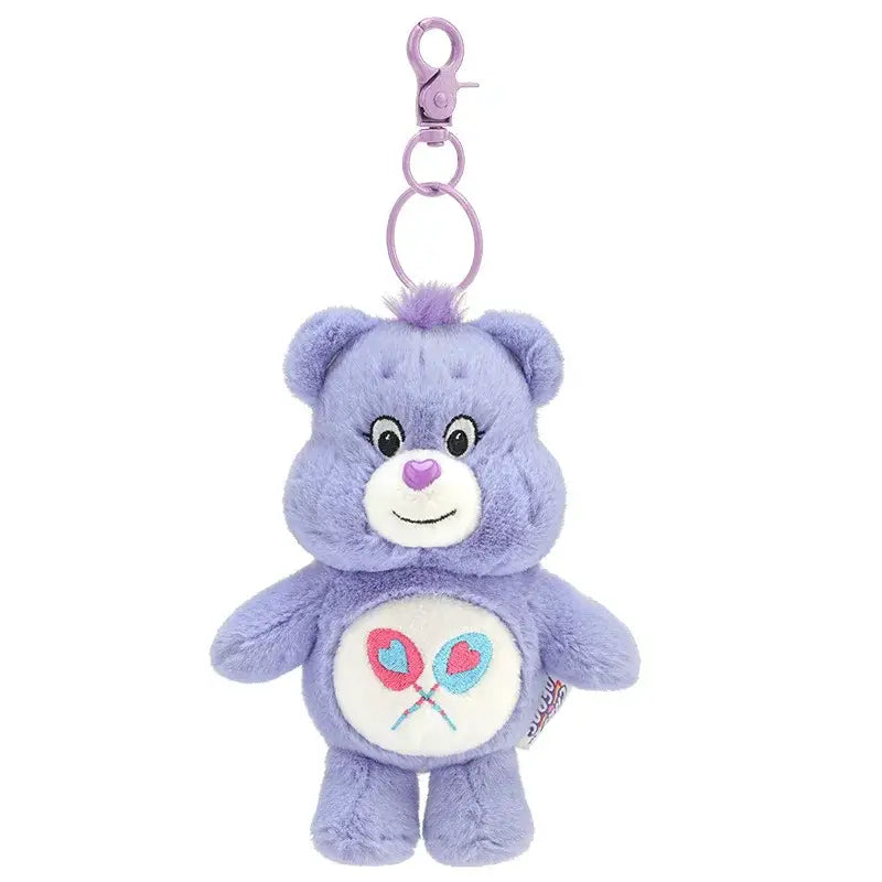 Porte-clé peluche bisounours violet avec motif sucette brodé sur le ventre en peluche douce