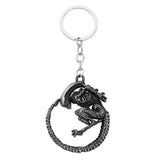 Porte-clés alien covenant en métal noir avec xénomorphe d’alien détaillé enroulé autour d’une chaîne circulaire