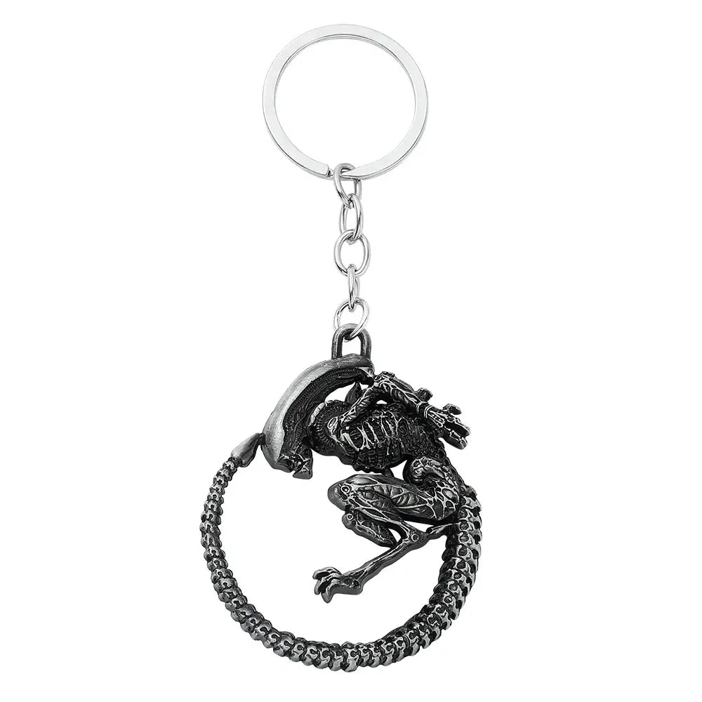 Porte-clés alien covenant en métal noir avec xénomorphe d’alien détaillé enroulé autour d’une chaîne circulaire