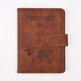 Protège-passeport rfid en cuir marron avec motif mappemonde et avion embossé pour sécurité voyage