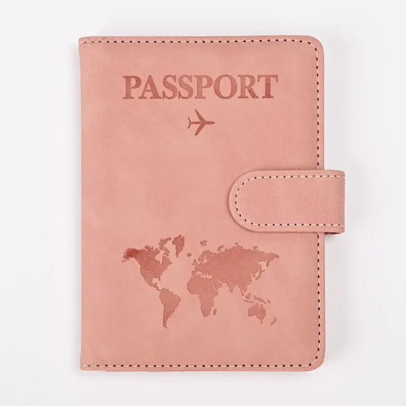 Protège-passeport rfid antimagnétique en cuir rose poudré avec carte du monde et avion en relief