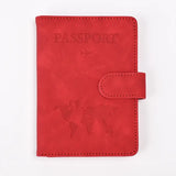 Protège-passeport rfid cuir rouge en cuir synthétique avec design embossé carte du monde et avion