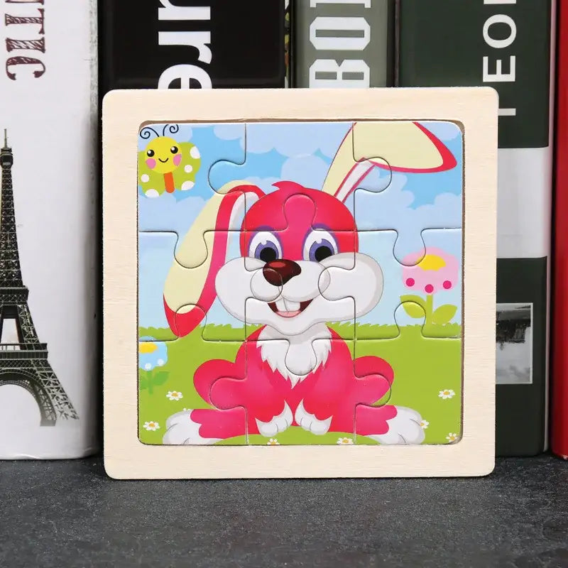 Puzzle bois pédagogique bébé avec lapin rose souriant en bois coloré pour motricité fine et petites mains en extérieur