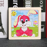 Puzzle bois pédagogique bébé avec lapin rose souriant en bois coloré pour motricité fine et petites mains en extérieur