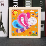 Puzzle bois pédagogique bébé avec papillon coloré souriant rose violet bleu pour motricité fine petites mains