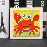 Puzzle bois pédagogique bébé avec crabe rouge cartoon, yeux verts, ventre arc-en-ciel, pour motricité fine petites mains