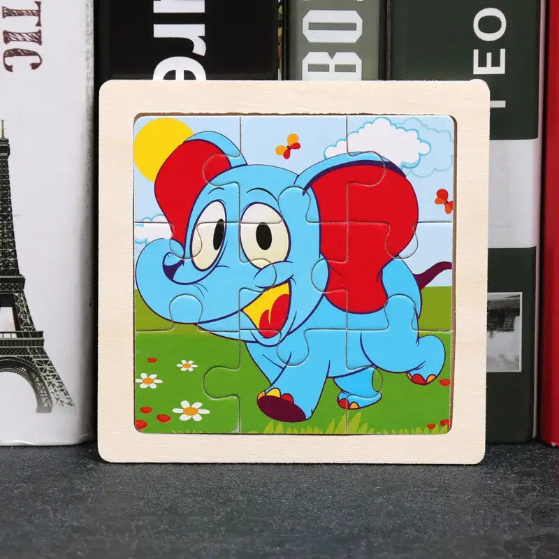 Puzzle bois pédagogique bébé avec éléphant bleu coloré pour motricité fine des petites mains en plein air