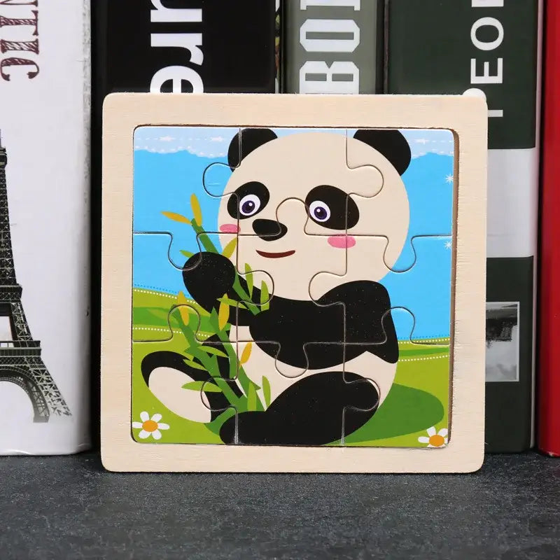 Puzzle bois pédagogique bébé en bois avec panda cartoon noir et blanc tenant du bambou pour motricité fine petites mains