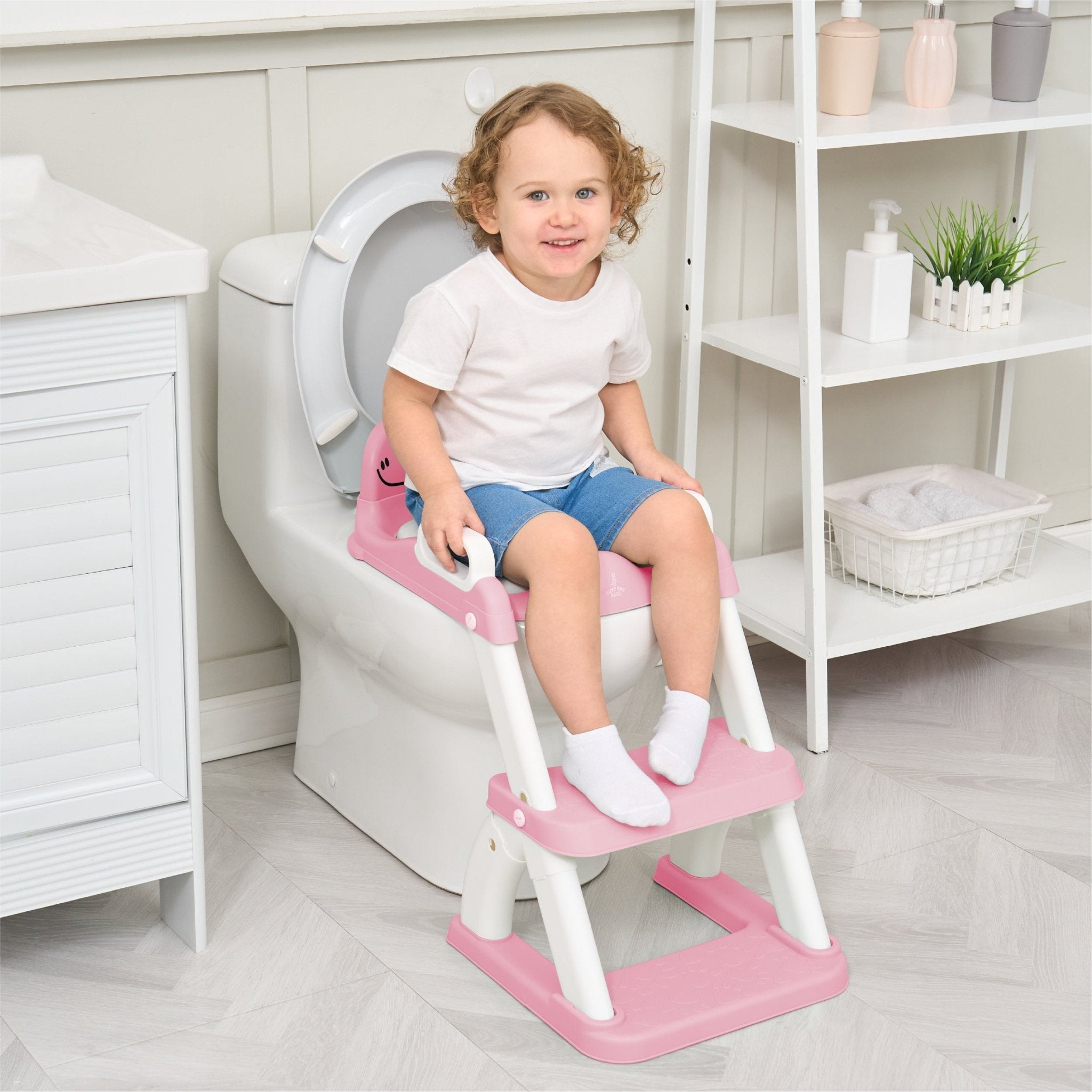 Réducteur de toilette DINO avec marche pliable