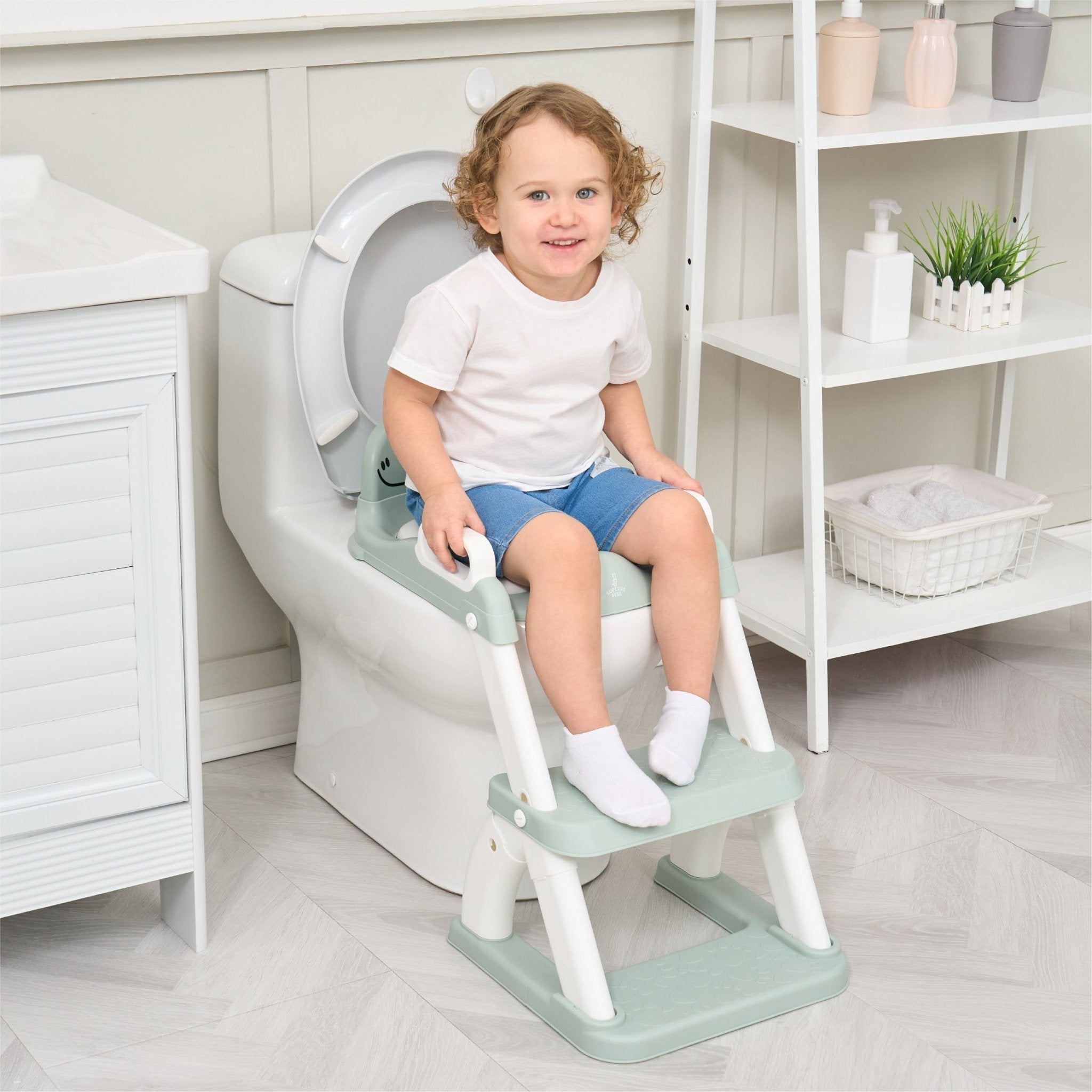 Réducteur de toilette DINO avec marche pliable