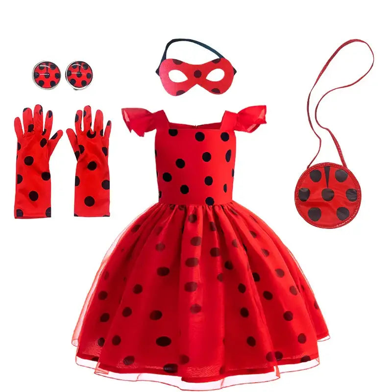 Robe costume coccinelle ladybug miraculous rouge à pois avec manches volantées et jupe tulle transparente pour petite justicière