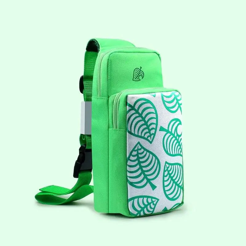 Sac à bandoulière vert clair en toile pour Nintendo Switch avec panneau blanc à motifs feuilles teal et compartiment rembourré