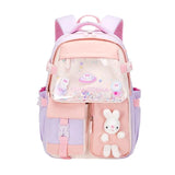 Sac à dos d’école pour enfants orthopédique pastel rose et lavande avec poche avant transparente décorée d’enfant lapinou en peluche