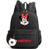 Sac à dos disney minnie mouse noir avec nœud rouge à pois, logo mickey en lettres rouges et porte-clés cochon peluche compagnon idéal avec nombreux compartiments cartable minnie mouse