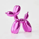 Sculpture chien ballon brillant rose métallique vibrant avec surface réfléchissante et effet glossy inspirée de chien ballon jeff koons