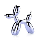 Sculpture chien ballon brillant en chrome poli représentant un chien ballon façon jeff koons
