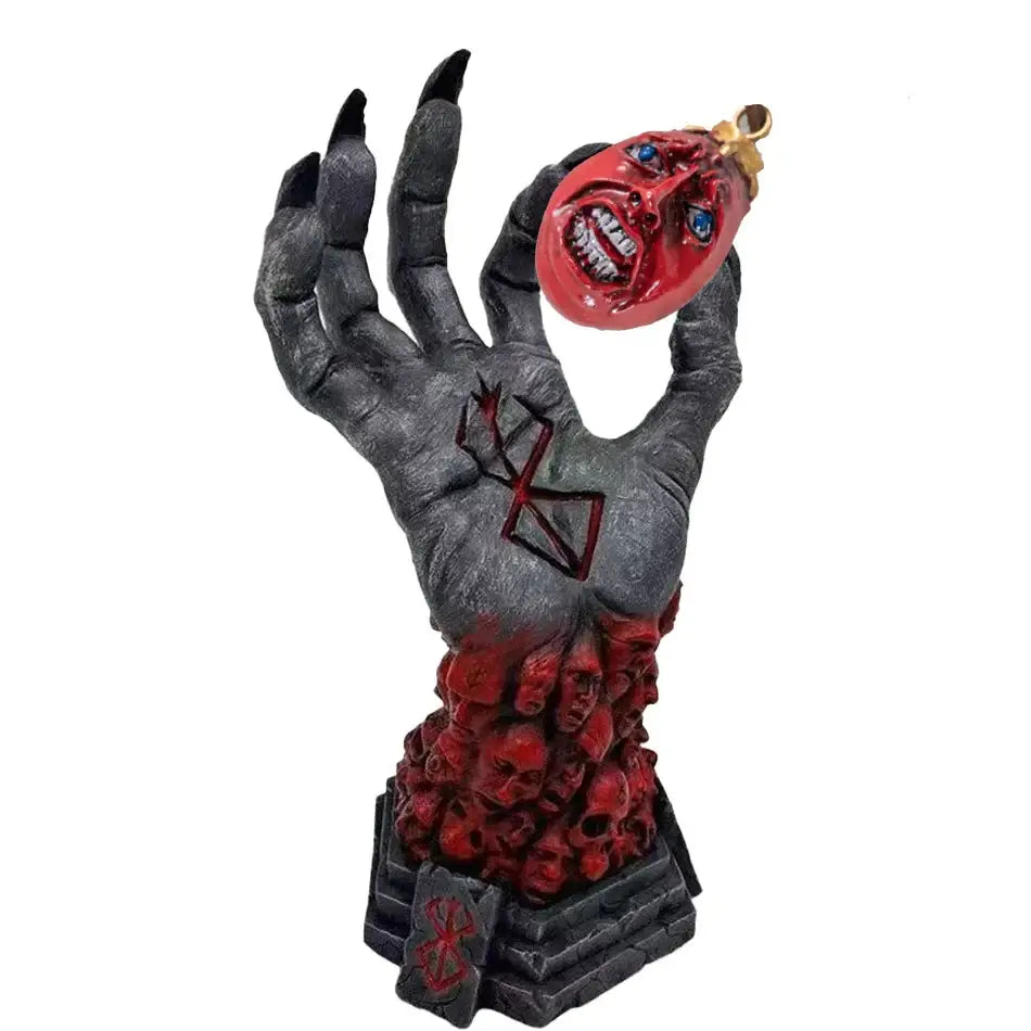 Statue résine berserk dark fantasy de kentaro miura main gris foncé texturée tenant bombe rouge grotesque