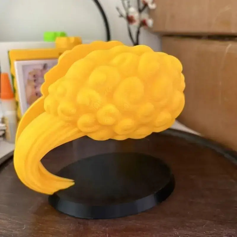 Support manette dragon ball z nuage magique jaune texturé en 3d sur base noire pour setup gaming