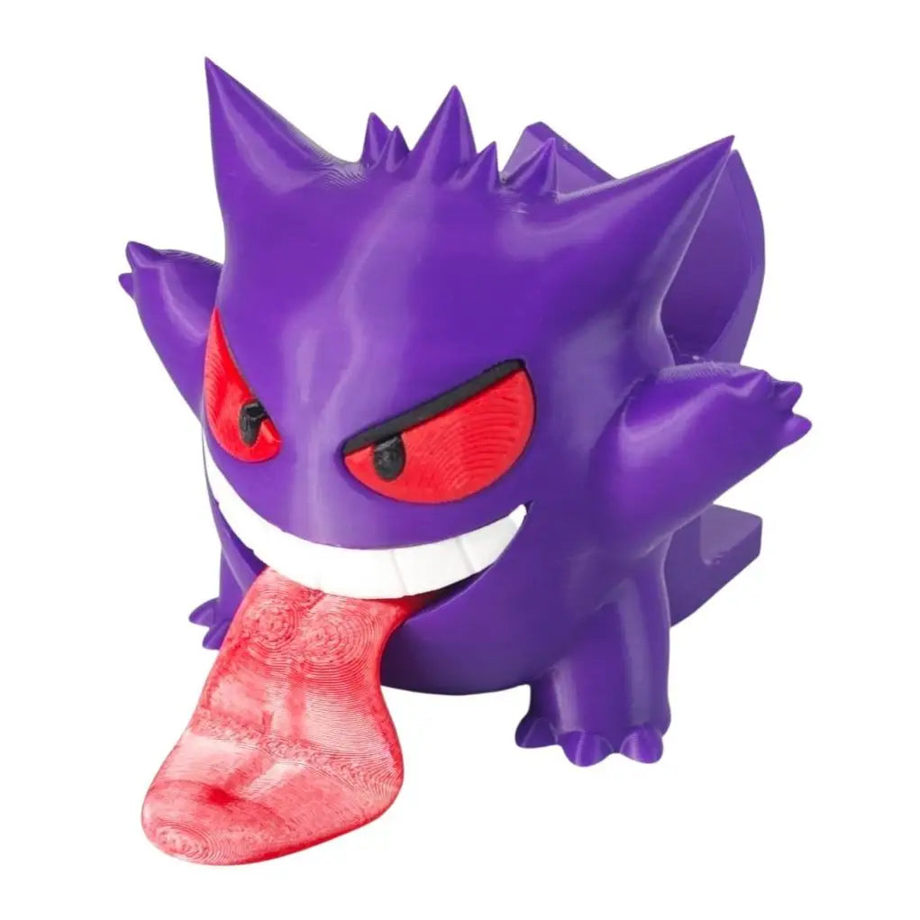 Figurine support manette pokémon ectoplasma purple avec yeux rouges et longue langue rose texturée pour espace gaming