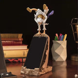 Figurine portable design unique monkey d luffy en blanc et or sur support téléphone rocheux support gear portable