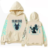 Sweatshirt à capuche homme femme go down crème avec graphique kamui noir et teal et motifs graffiti teal sur les manches