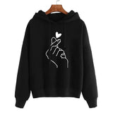 Sweatshirt à capuche love money noir avec motif graphique blanc main faisant le geste doigt coeur